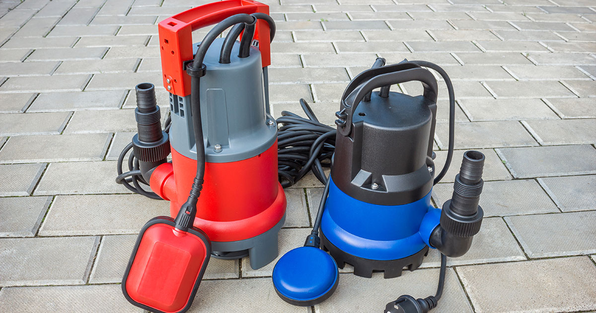 red and blue sump pumps for basement waterproofing