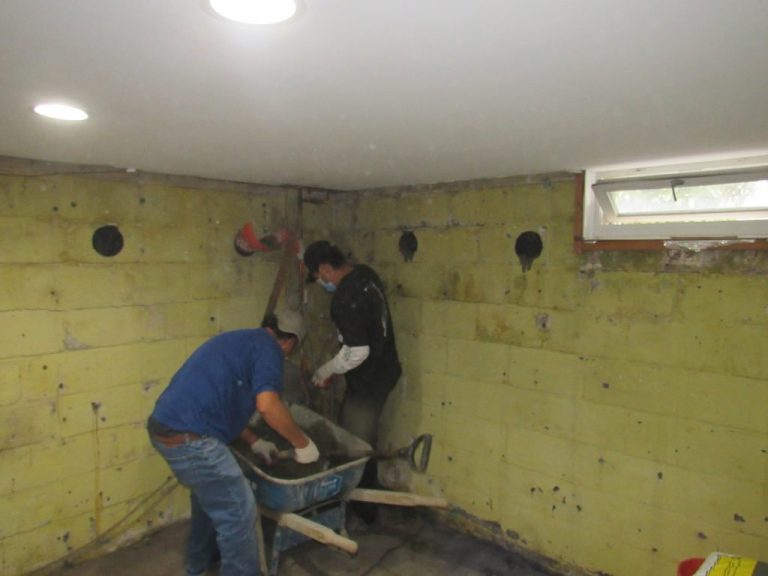 workers remodeling a basement in Washington
