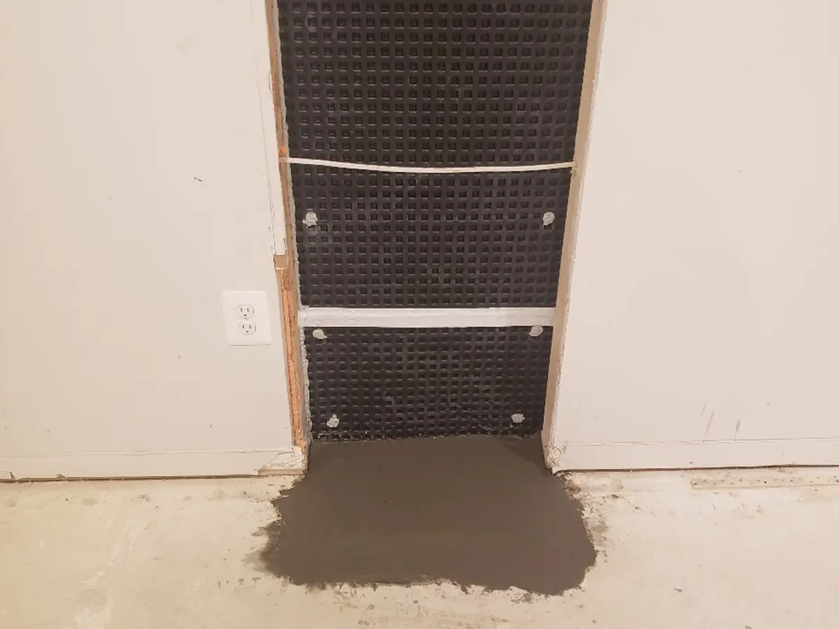 Waterproofing a basement floor