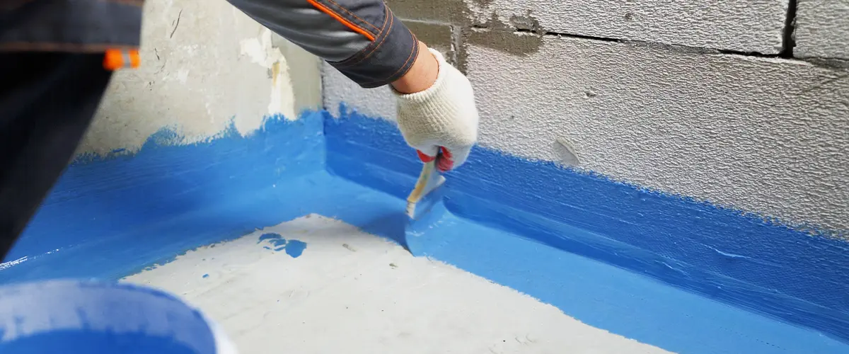 Waterproofing with a blue shade brush