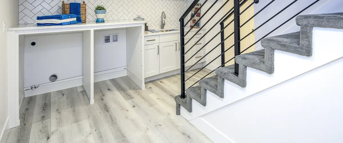 the best flooring for Basement laundry room with a sink.